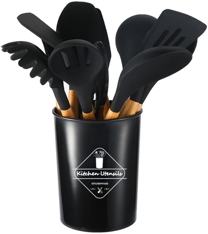 Set of black silicone kitchen utensils in a black holder with a visible brand logo.